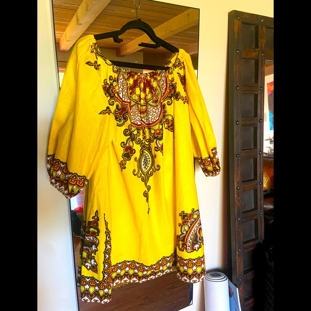 Golden Sunshine On & off the shoulder dress made from Arkana In Africa.